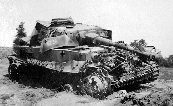 Photo of wrecked German Panzer IV Type H tank taken on St Lo to Periers road, near Saint Lo, France, 05 September 1944 during World War II.