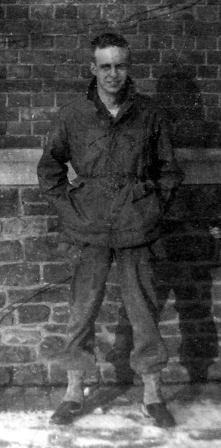 Photo of Private Tom Nix, 14th Chemical Maintenance Company, in his WW-II U.S. Army uniform, taken circa Winter of 1944-45 in Europe